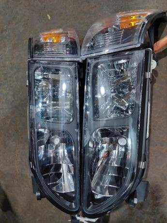 corolla-indus-ae100101-1993-2001-canadian-headlights-big-0